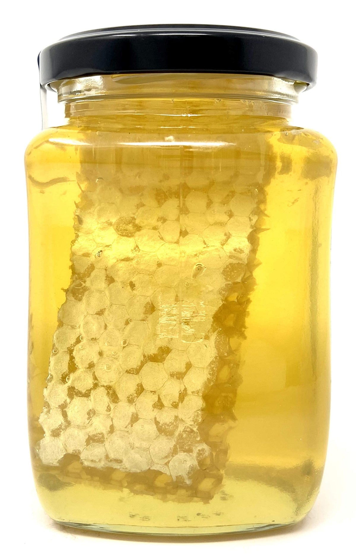 TAJ Gourmet Foods honeycomb closeup shows natural texture and golden aroma for gourmet tasting.