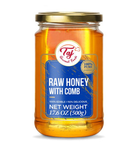 TAJ Gourmet Foods honeycomb on a wooden board, perfect for charcuterie and gifting.