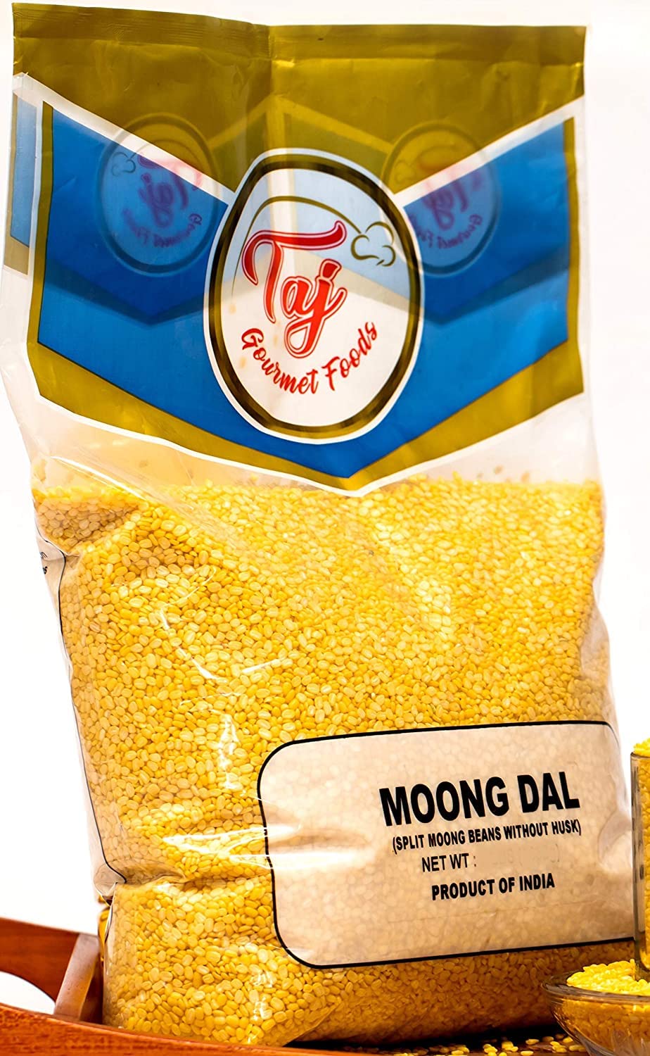 TAJ Moong Dal in a measuring cup, perfect for weeknight curries.