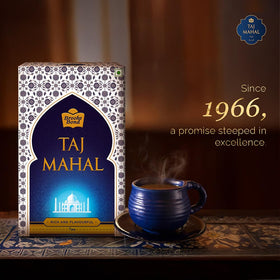 Taj Mahal long-leaf black tea being poured into a teacup for a rich brew.