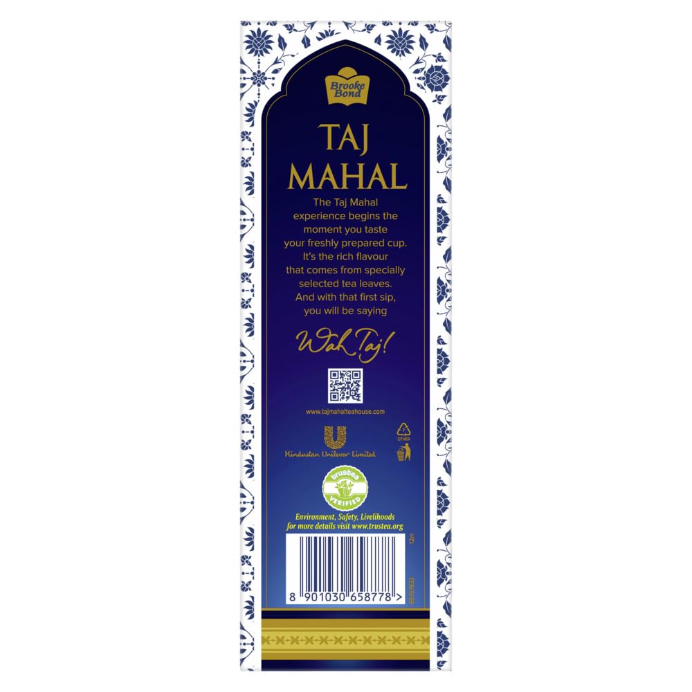 Pouring a cup as steam curls from Taj Mahal black tea.