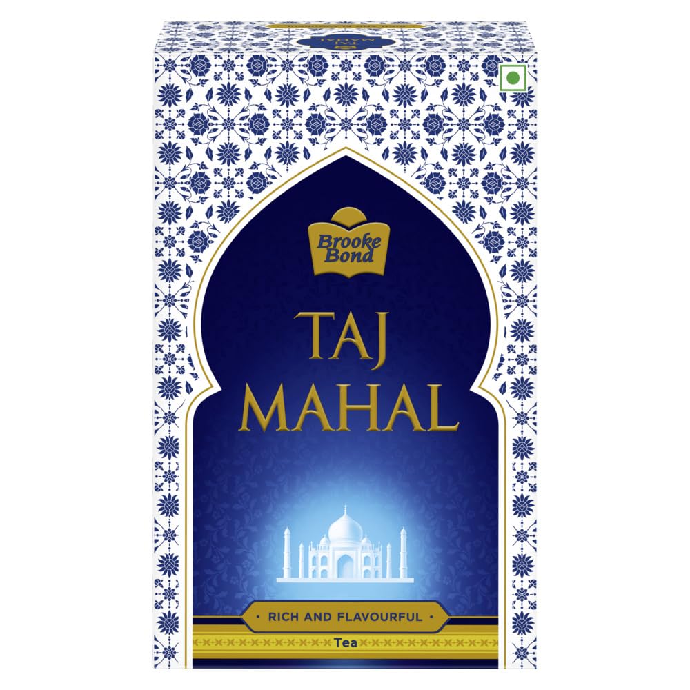 Taj Mahal Tea With Long Leaves 500g canister on shelf for daily black tea ritual.