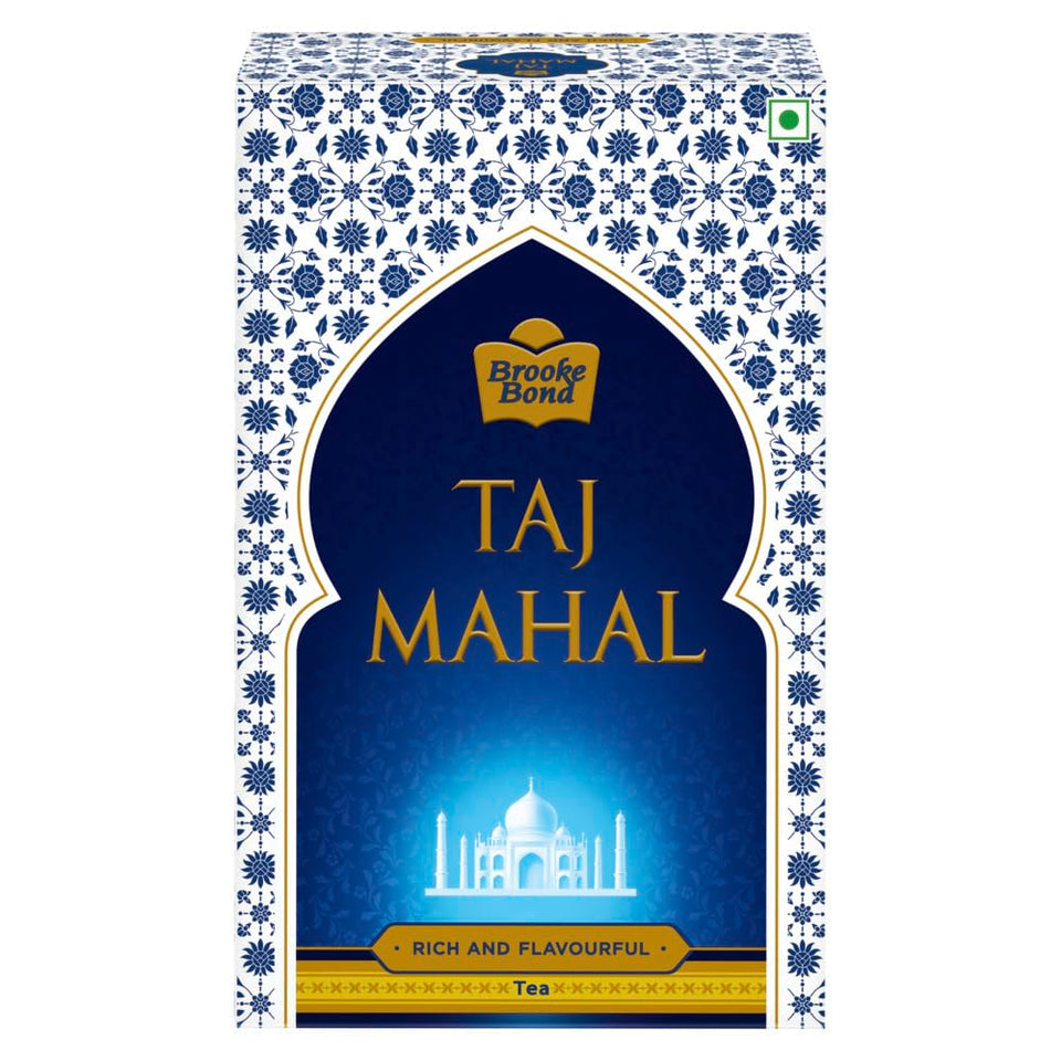 Taj Mahal Tea With Long Leaves 500g canister on shelf for daily black tea ritual.