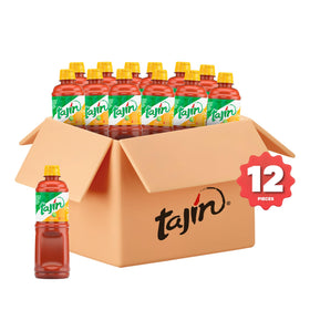 Tajín Fruity Chamoy Sauce bottle pour demonstrates easy drizzle on treats.