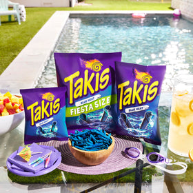 Takis Blue Heat rolls closeup reveals crisp texture and fiery flavor.