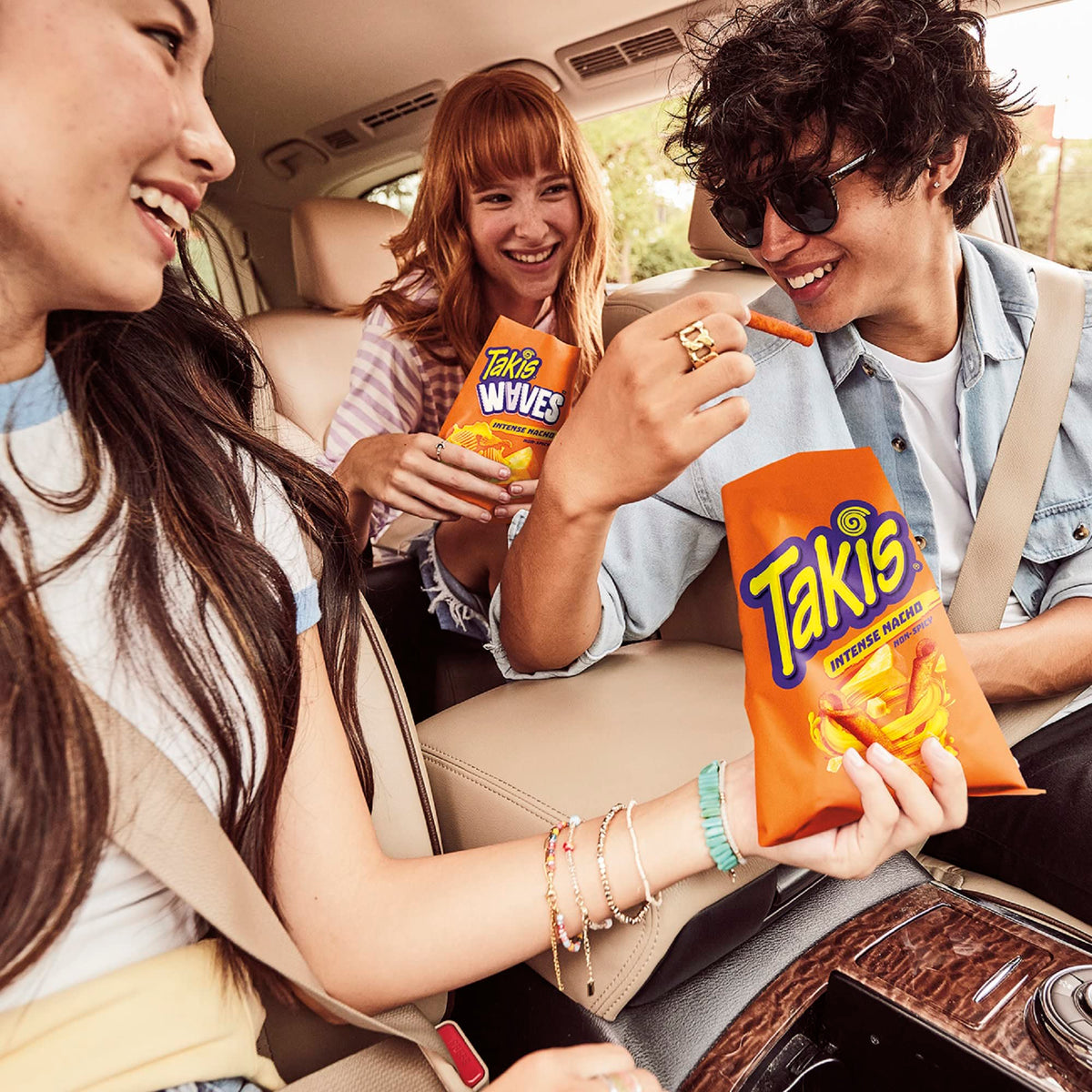 Takis cheddar cheese flavor snack bags on display, great for sharing