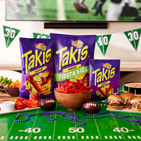 Takis Fuego bag open, ready for a quick, shareable snack.