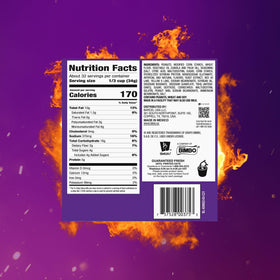 Person holding Takis Fuego Hot Nuts for quick boost.