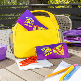 Takis Fuego Mini rolled chip detail, iconic spirals and heat.