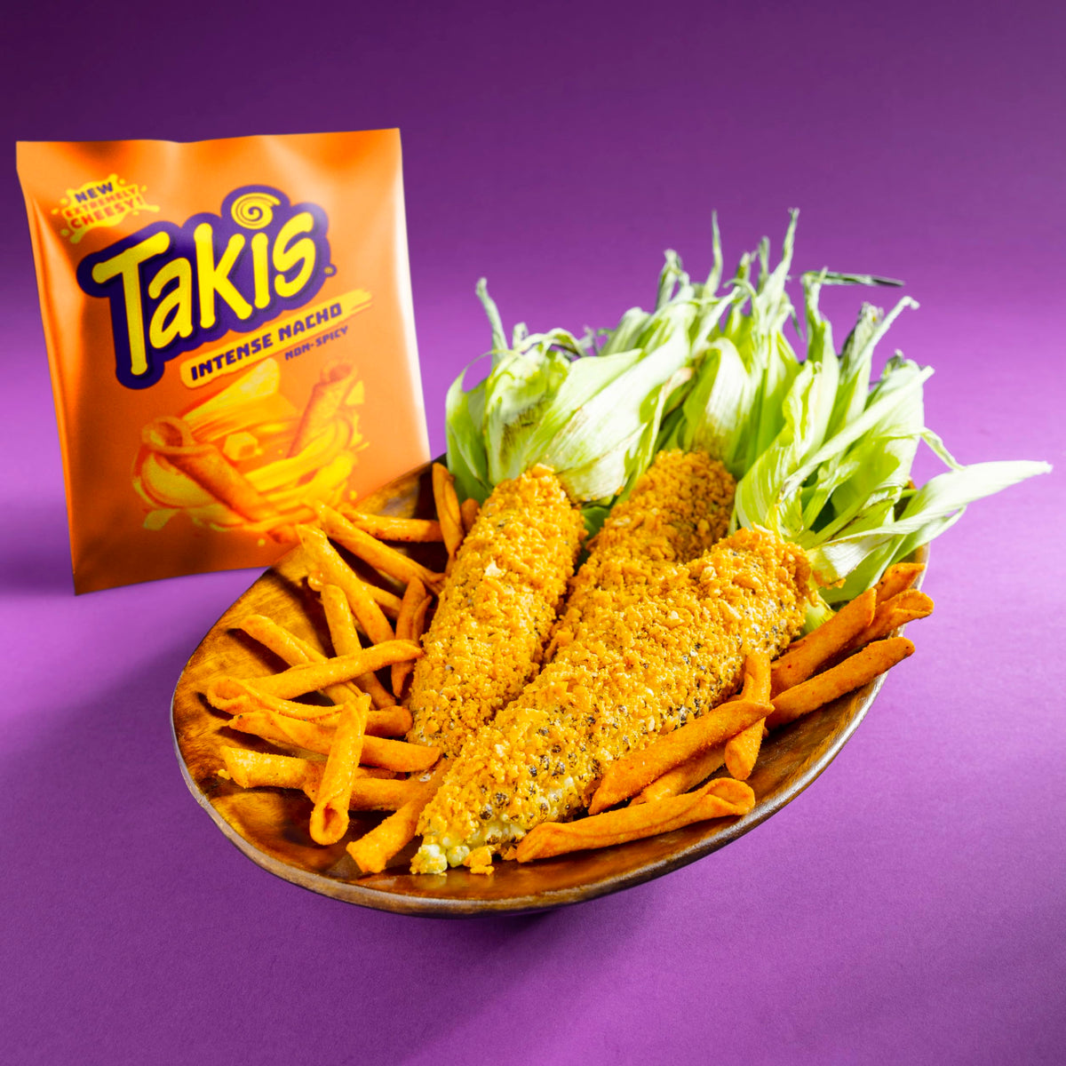 Takis Intense Nacho on-the-go pack in hand, snack anytime
