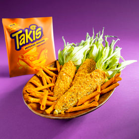 Takis Intense Nacho on-the-go pack in hand, snack anytime