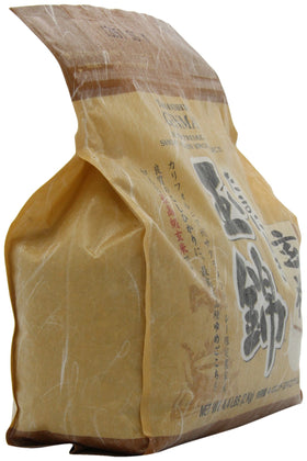 Tamanishiki brown rice packaging on a shelf, all natural.