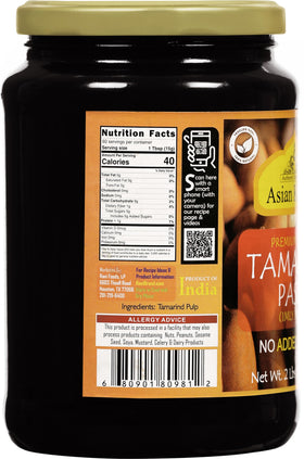 tamarind paste imli texture closeup highlighting glossy pulp and rich flavor base