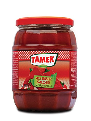 Tamek hot pepper paste jar boosts bold flavor in meals.