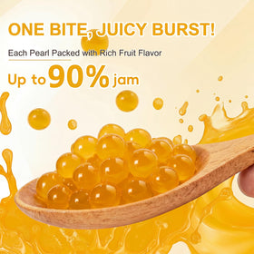 T&Tea Mango popping boba pearls closeup showing natural fruit filling for drinks.