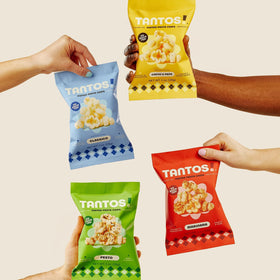 Tantos Puffed Pasta Chips closeup crunch with airy, golden chips