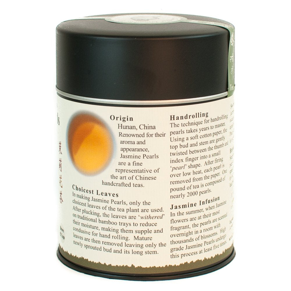 Closeup of jasmine pearls, The Tao of Tea, highlighting premium craft and aroma.