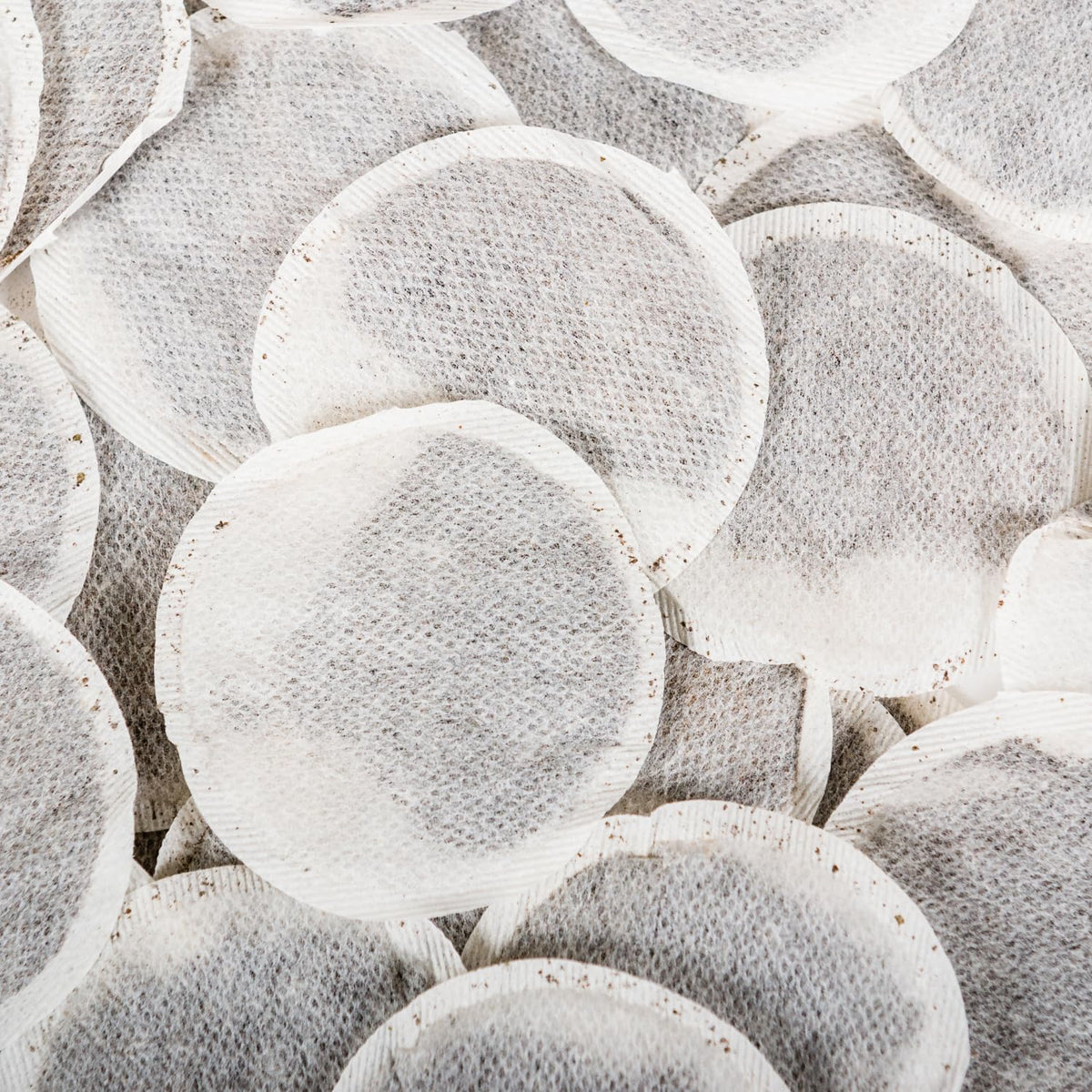Tapal Danedaar teabags brew with steam illustrating rich aroma and bold flavor potential.