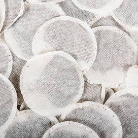 Tapal Danedaar teabags brew with steam illustrating rich aroma and bold flavor potential.