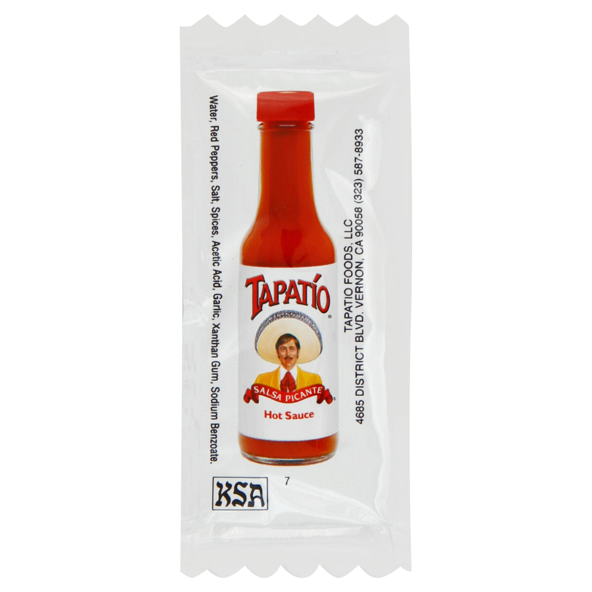 Tapatio hot sauce packets on a front-case display to invite quick flavor choices.