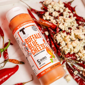 Taste Flavor Co. buffalo blue cheese marinade application coats meats for grilling.