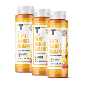 Taste Flavor Co Fiery Mango Habanero bottle pour showing bold heat and quick flavor boost