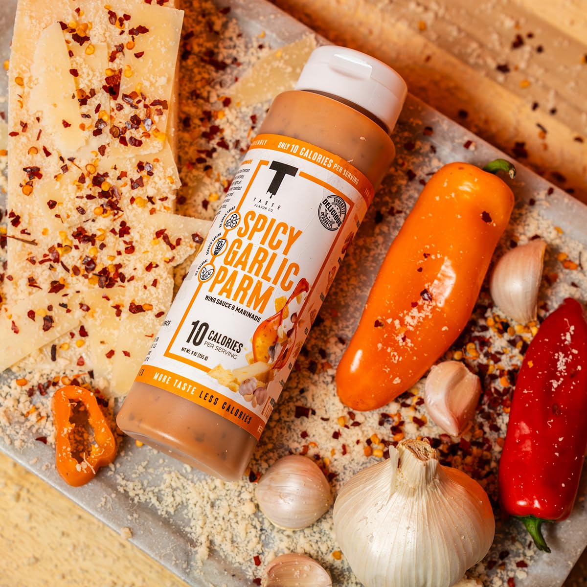 Taste Flavor Co. marination bottle beside fresh meat for quick weeknight meals.