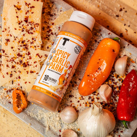 Taste Flavor Co. marination bottle beside fresh meat for quick weeknight meals.