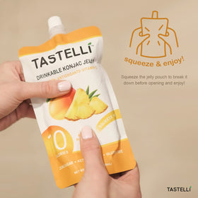 Tastelli Konjac Jelly Collagen Mango Pineapple ingredients close-up, featuring collagen and vitamin C for daily wellness.
