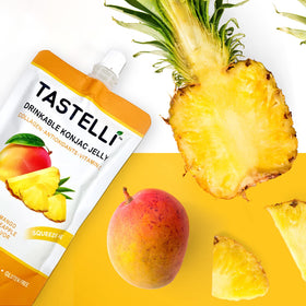 Tastelli Konjac Jelly Collagen Mango Pineapple texture close-up, plant-based satisfaction.