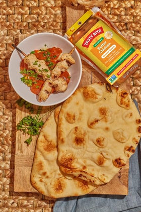 TASTY BITE Butter Chicken sauce for stovetop prep with vegetables.
