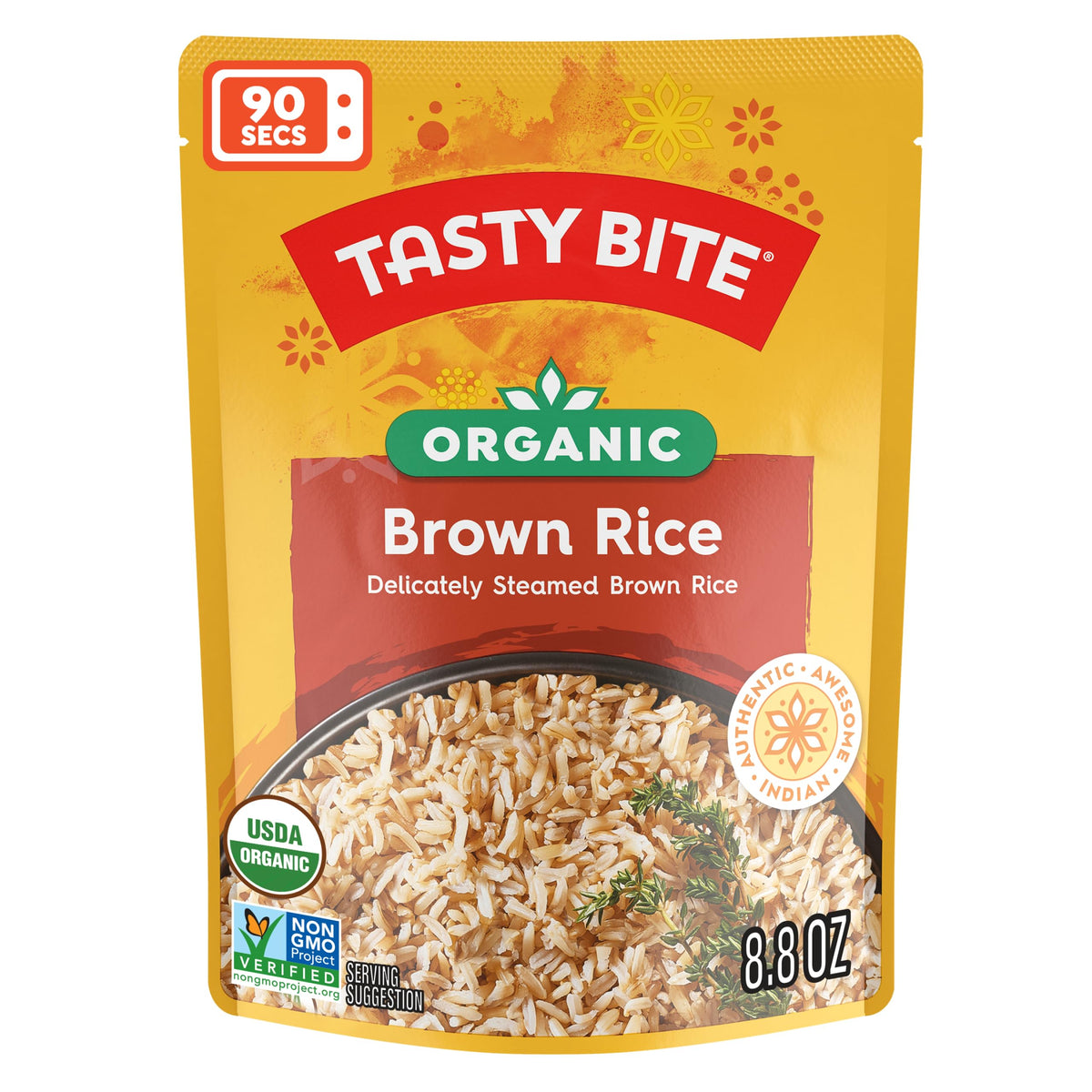 Tasty Bite organic brown rice steaming in a bowl, ready to serve.