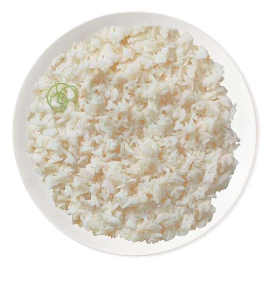 Six-pack display of Tasty Bite sticky rice on kitchen counter