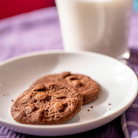 Bulk four-pack Tate's Bake Shop Double Chocolate Chip Cookies for easy entertaining.