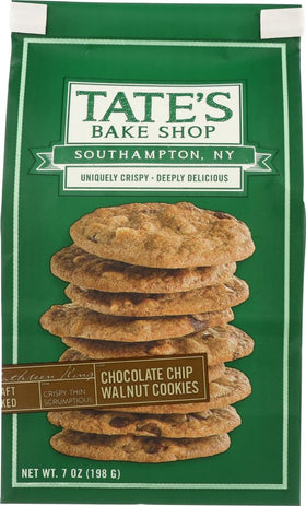Tate's Chocolate Chip Walnut cookie on a plate shows crisp edges and golden color.