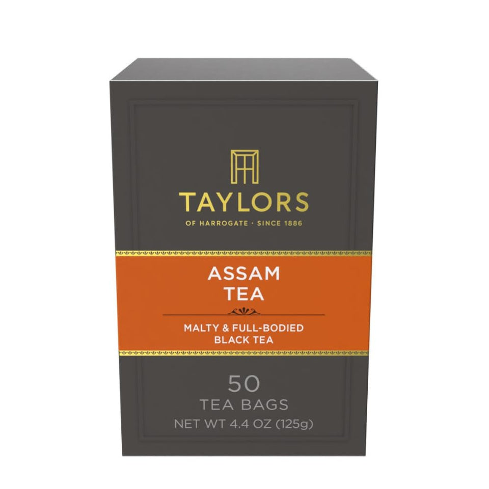 Taylors of Harrogate Assam pillow bag box showing premium packaging and rich tea color