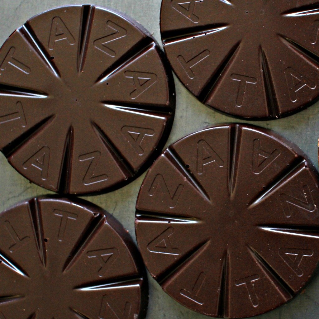 Taza Mexicano Disc 85% sits ready for hot or iced chocolate.