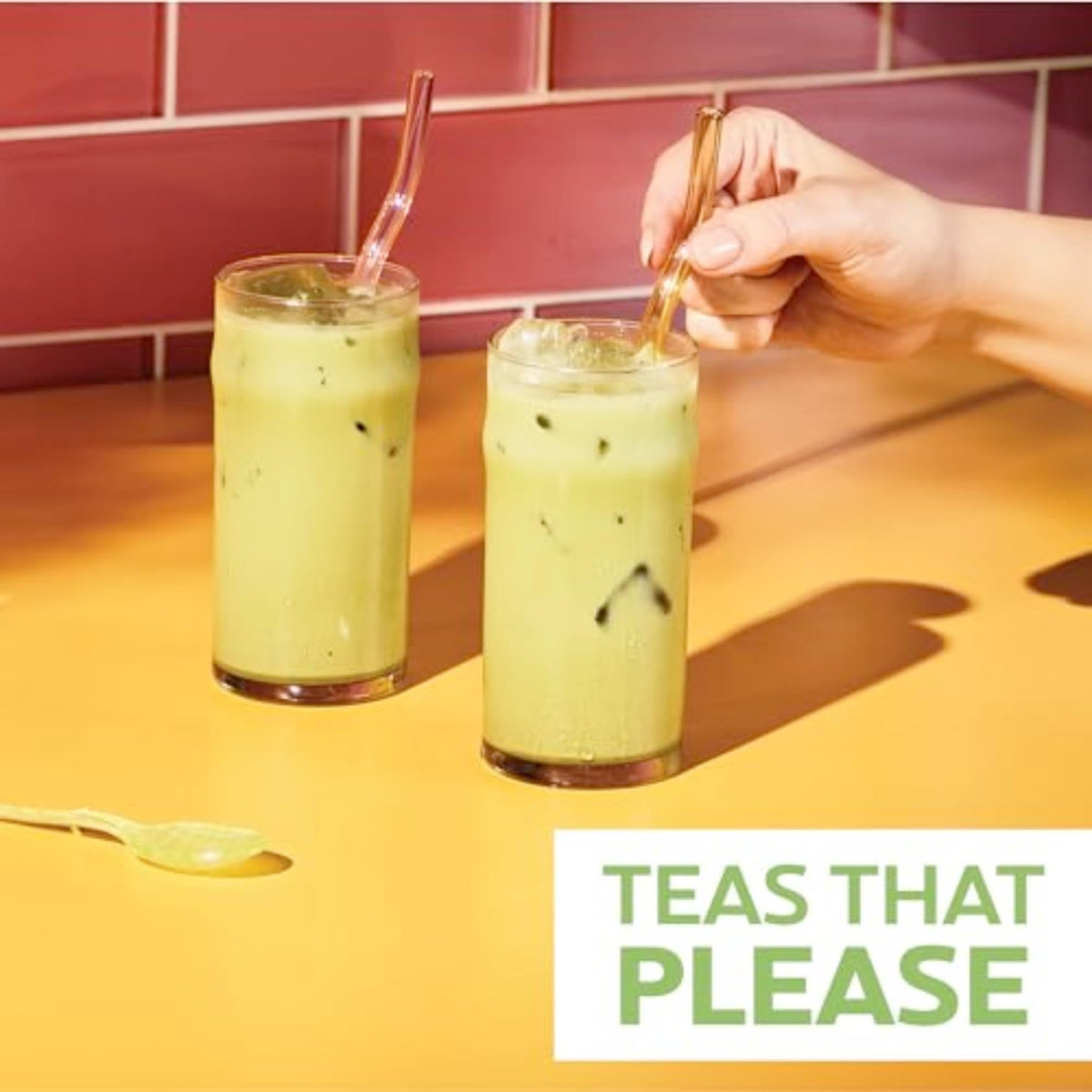 Iced latte ready with TAZO concentrate over ice and milk.