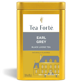 Tea Forte Earl Grey canister with artwork preserves freshness while elevating deskside aesthetics.