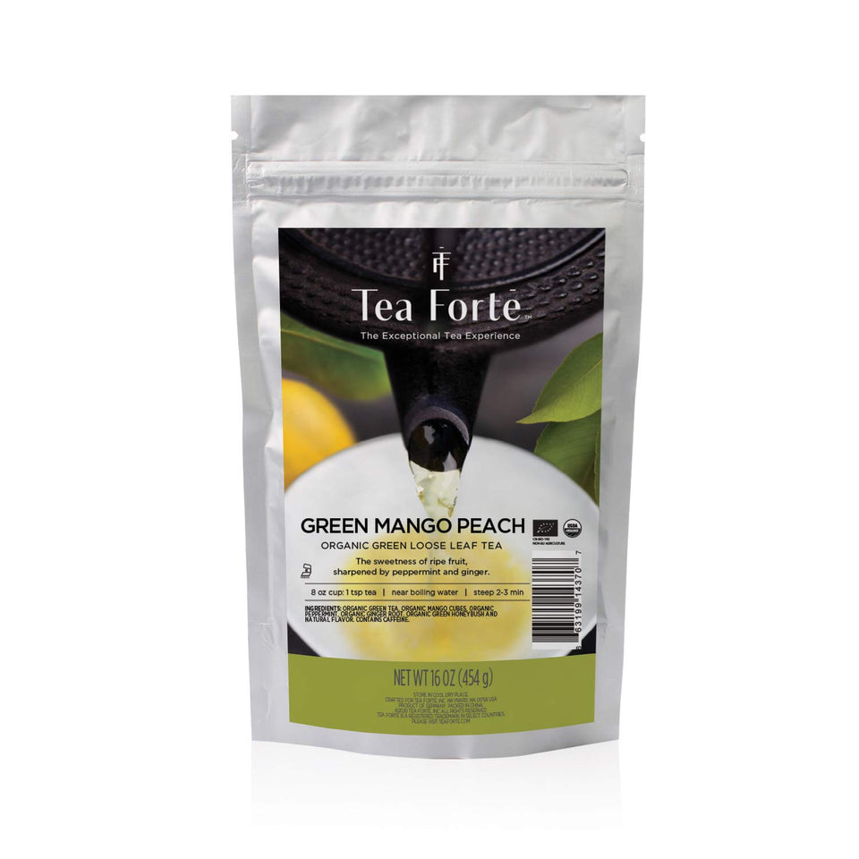 Tea Forte premium loose-leaf green mango peach tea in a 1lb bag for flavorful sessions.