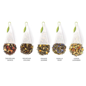 Tea Forte pyramid tea bags close-up, leaves unfurling for rich flavor