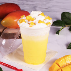 Tea Zone Mango Powder smoothie prep, with vibrant color and tropical aroma.