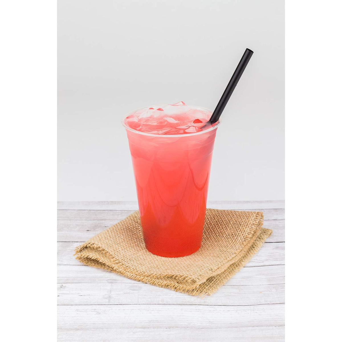 Tea Zone strawberry syrup mixed into a cocktail for fruit-forward notes