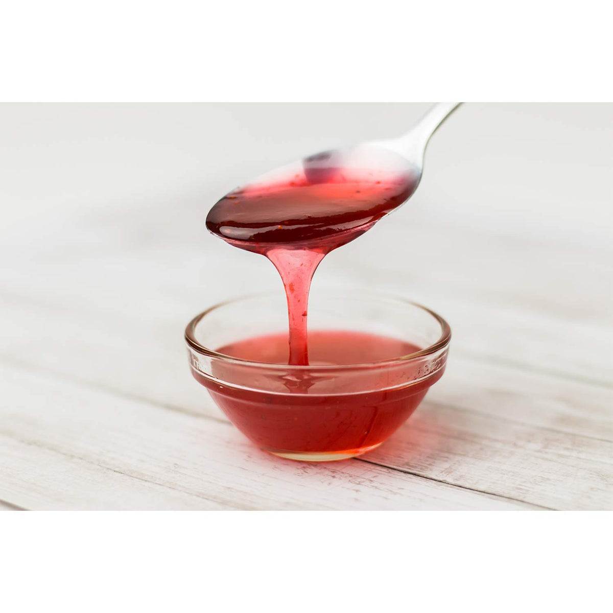 Tea Zone strawberry syrup swirled into a smoothie for fruity boost