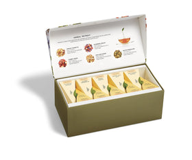 Tea Forte Blueberry Merlot pyramid tea bag releasing fruity aroma.