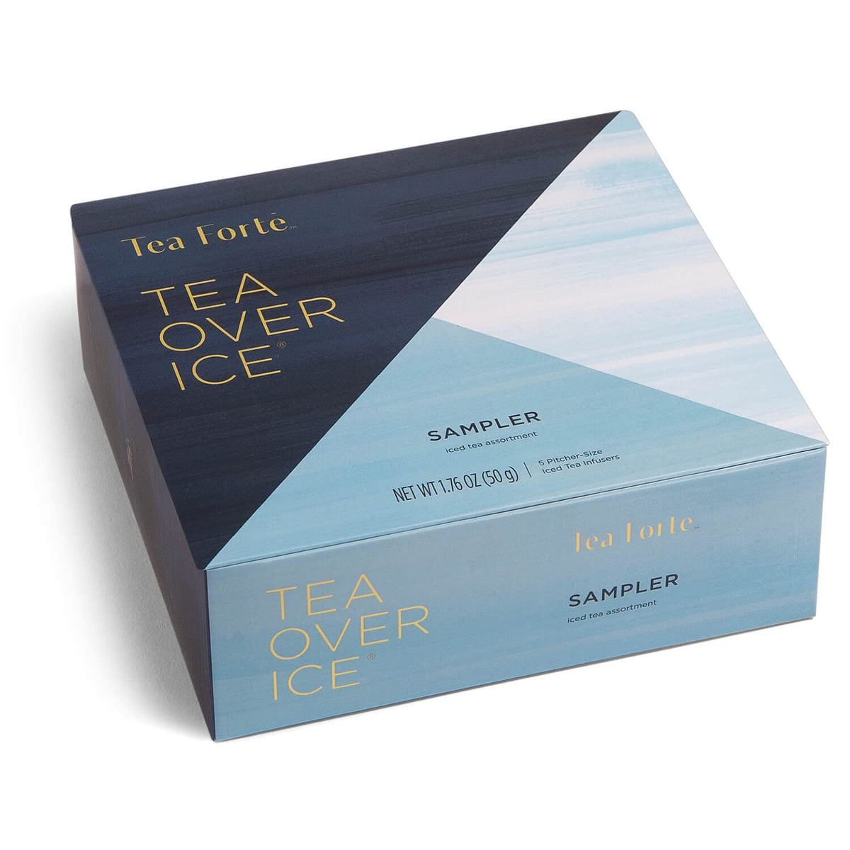 Tea Forte Orange Papaya pyramid infuser releasing citrus aroma for iced tea