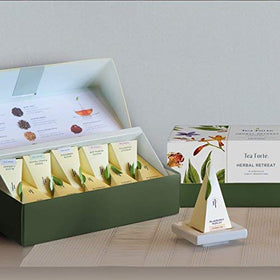 Tea Forte presentation box opened to reveal premium pyramid infusers for gifting.