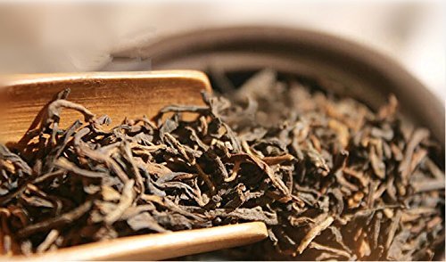 Tealyra Ripe Pu'erh tea brewed cup showing bold flavor and caffeine.