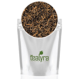Tealyra Yunnan Golden Special steeping tea with steam for a cozy morning.