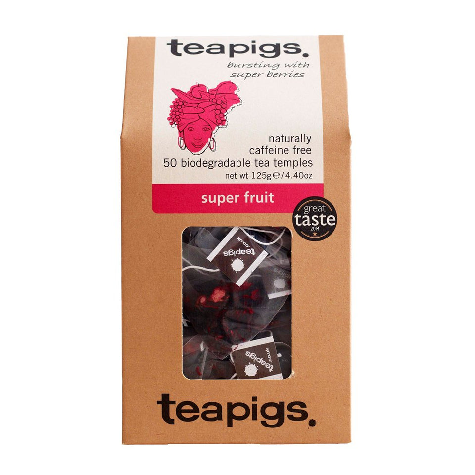 Teapigs Super Fruit Tea box showcasing whole cranberries and blueberries for natural flavor